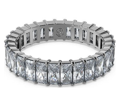 Silver eternity ring with princess-cut diamonds on a white background