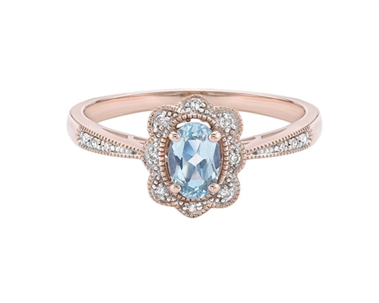 10K Rose Gold 6x4mm Oval Cut Sky Blue Topaz and 0.055cttw Diamond Ring - Size 7