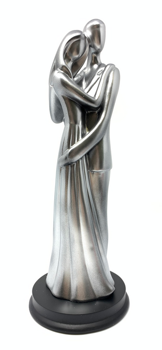 Figuras de pareja de plata antigua sobre base de madera