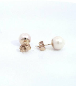 Aretes de perlas cultivadas de 7 a 7,5 mm en oro amarillo de 14 quilates con cierre de mariposa