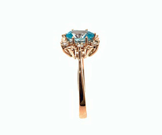Anillo de oro rosa de 10 quilates con circonita azul de talla ovalada auténtica de 1,20 quilates y halo de diamantes de 0,09 quilates, talla 7