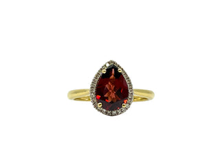 Anillo de oro amarillo de 10 quilates, granate en forma de pera de 10 x 7 mm y diamante de 0,135 quilates