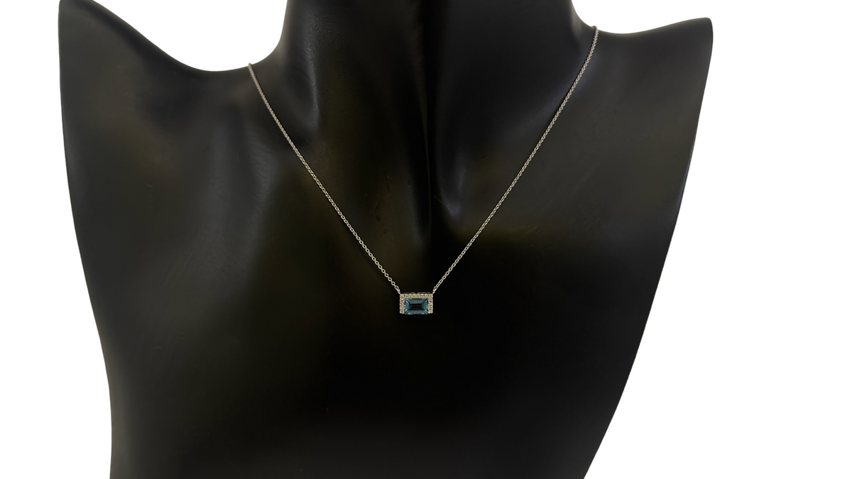 Collar de oro blanco de 14 quilates con topacio azul de 0,62 quilates y diamantes de 0,04 quilates - 18 pulgadas