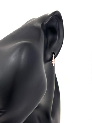 Pendientes tipo argolla con bisagras Huggie de diamantes de 0,15 quilates en oro rosa de 10 quilates