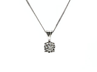 Colgante de diamantes con engaste de ilusión de 4 garras de 0,07 quilates en oro blanco de 10 quilates
