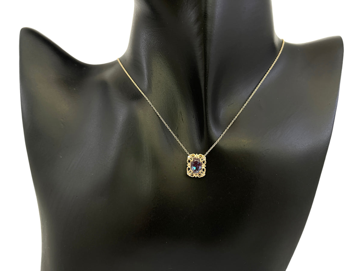 10K Yellow Gold 7x5mm Oval Cut Created Alexandrite and 0.03cttw Diamond Necklace - 18 Inches