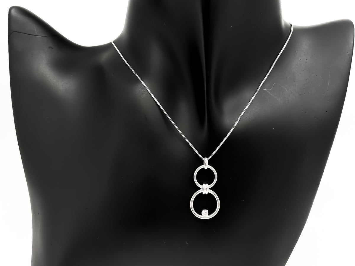 Sterling Silver 0.11cttw Diamond Double Infinity / Circle Necklace, 18&quot;