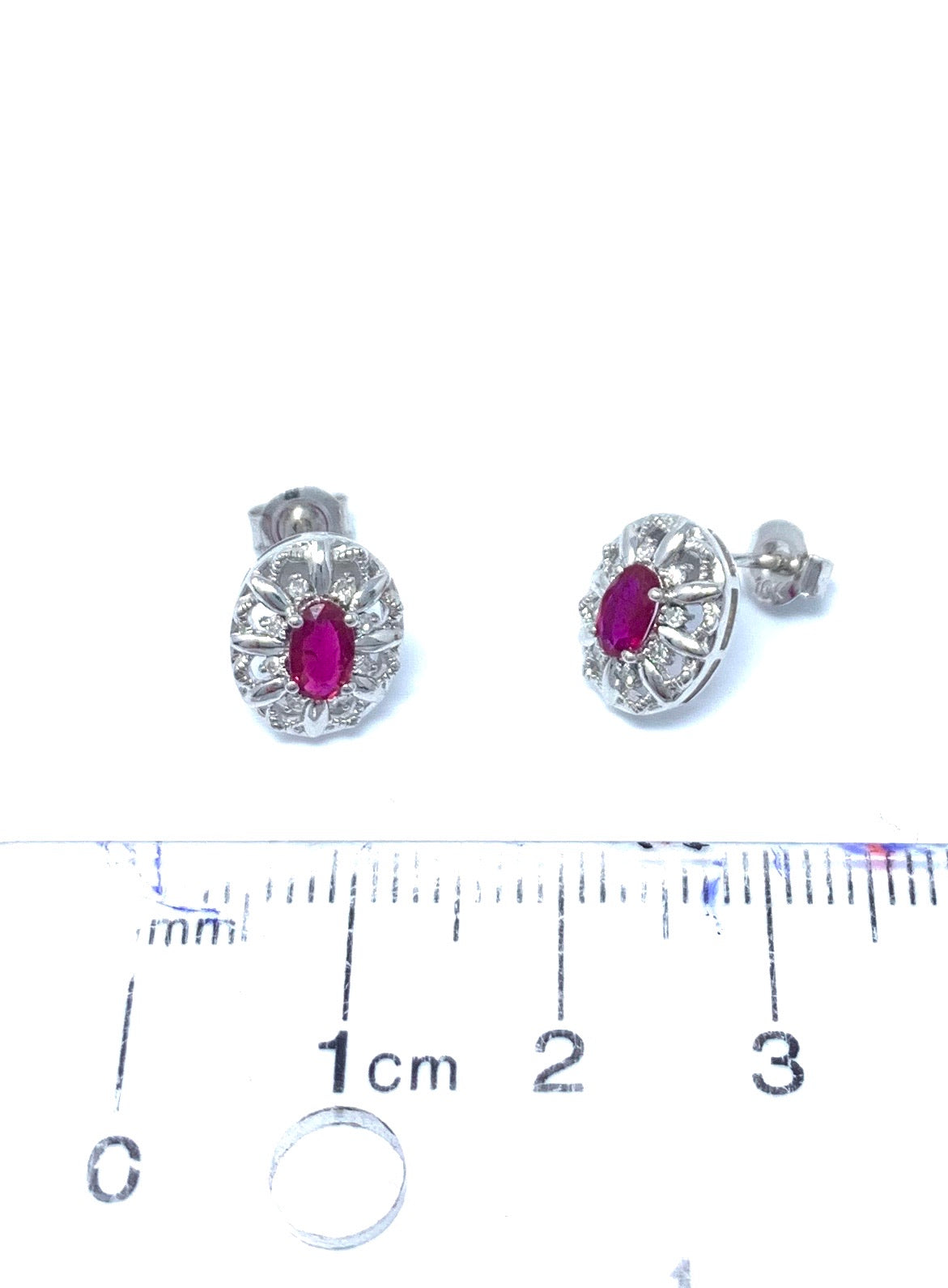 10K White Gold 0.65cttw Genuine Ruby and 0.08cttw Diamond Earrings