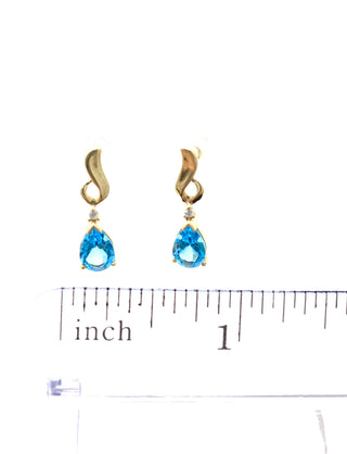 Pendientes de oro amarillo de 14 quilates con topacio azul y diamantes de 0,03 quilates