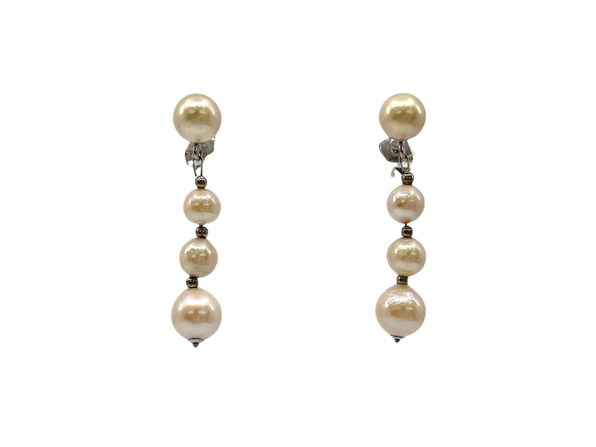 Aretes colgantes de perlas cultivadas en oro blanco de 14 quilates