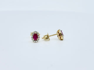 Aretes de oro amarillo de 10 quilates con rubí genuino