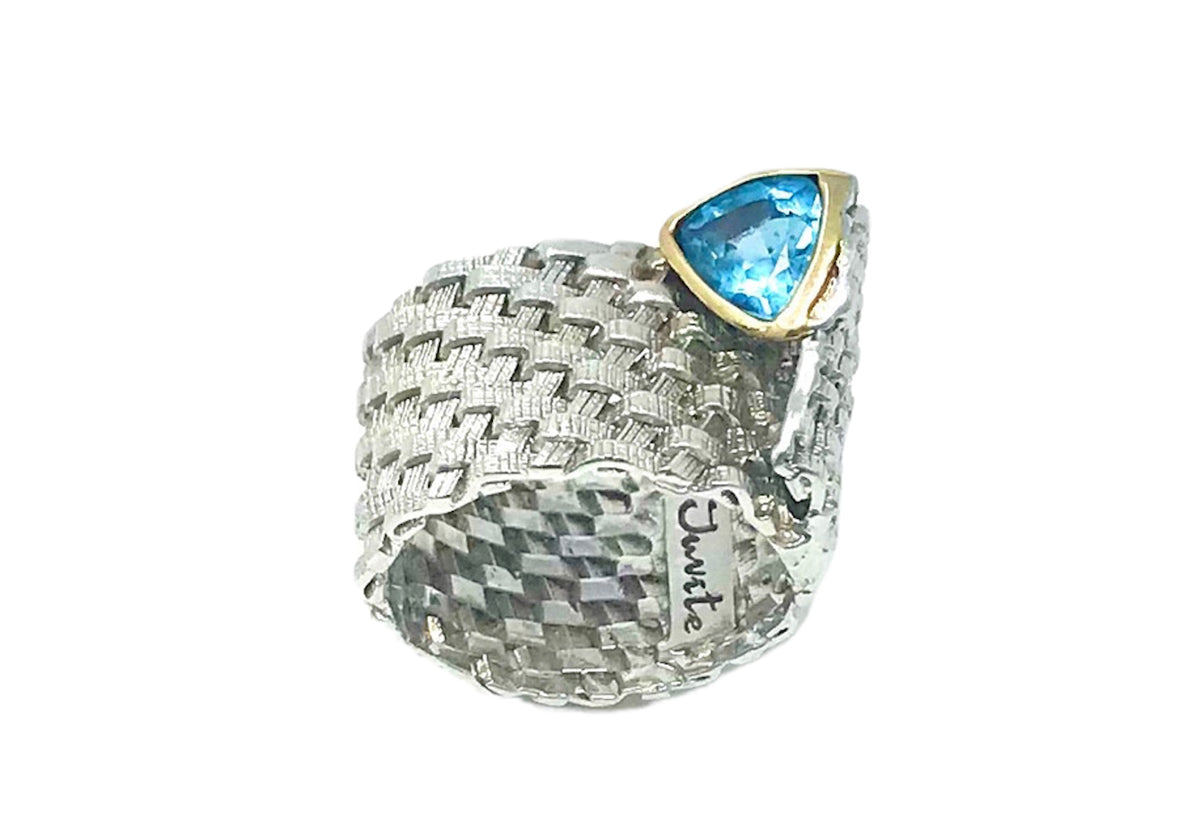 Anillo de plata y topacio azul