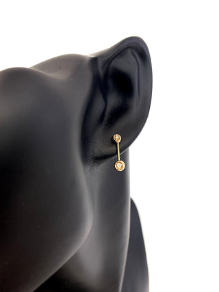 Aretes oscilantes de diamantes de 0,09 quilates en oro amarillo de 14 quilates con parte posterior de mariposa - 4 mm x 14 mm