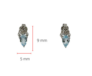 Aretes de oro blanco de 10 quilates con topacio azul suizo de talla pera de 6x4 mm y diamantes de 0,03 quilates