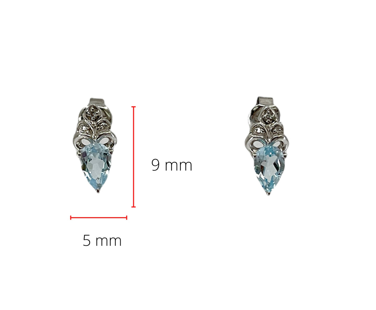 Aretes de oro blanco de 10 quilates con topacio azul suizo de talla pera de 6x4 mm y diamantes de 0,03 quilates