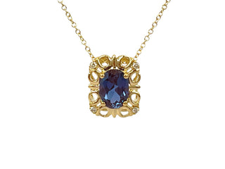 10K Yellow Gold 7x5mm Oval Cut Created Alexandrite and 0.03cttw Diamond Necklace - 18 Inches