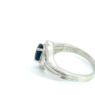 Anillo de plata de ley 925 con zafiro azul de 7 x 5 mm y diamante de 0,03 quilates, talla 6