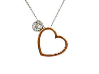 Collar con forma de corazón de diamantes canadienses de 0,09 quilates en oro blanco y rosa de 10 quilates, 18"