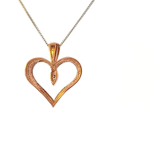 Colgante en forma de corazón con diamantes de 0,008 quilates en oro blanco y rosa de 10 quilates, 18"
