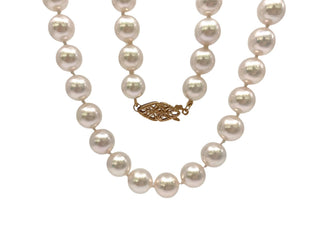 Hebra de perlas cultivadas blancas de 7-7,5 mm con cierre de perlas de oro amarillo de 14 k - 18"