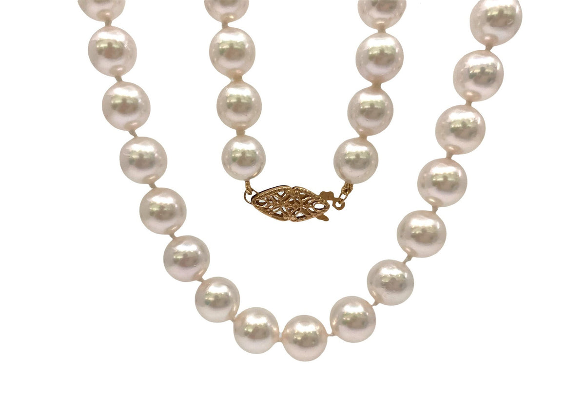 Hebra de perlas cultivadas blancas de 7-7,5 mm con cierre de perlas de oro amarillo de 14 k - 18&quot;