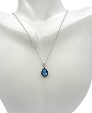 10K White Gold 7x5mm Pear Cut Sky Blue Topaz with Blue Sapphire Halo and 0.03cttw Diamond Necklace - 18 Inches