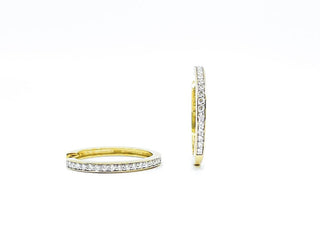 Aretes tipo argolla con diamantes de 0,25 quilates en oro amarillo de 10 quilates