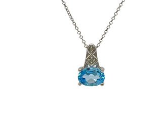 Colgante de diamantes y topacio azul en oro blanco de 10 quilates, 18"