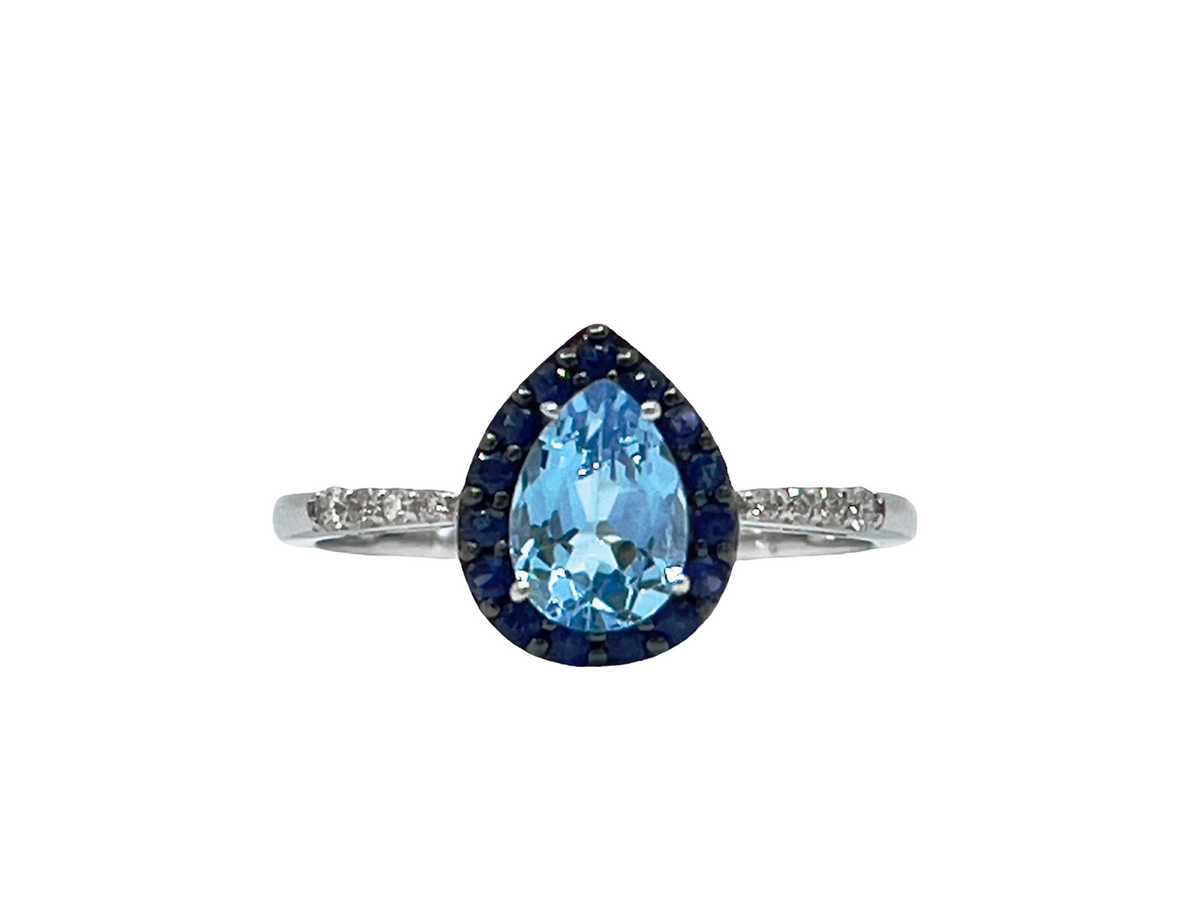 Oro blanco de 10 quilates, topacio azul cielo de talla pera de 7x5 mm con halo de zafiro azul y anillo de diamantes de 0,10 quilates - Tamaño 7