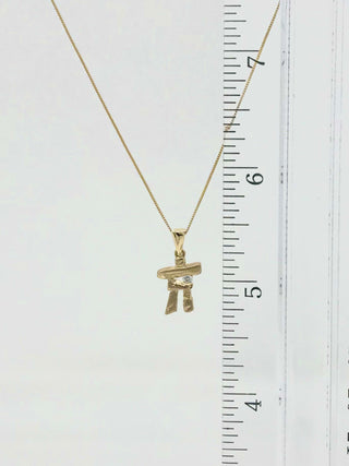 Colgante Inukshuk de diamantes de 0,054 quilates en oro amarillo de 10 quilates, 18"