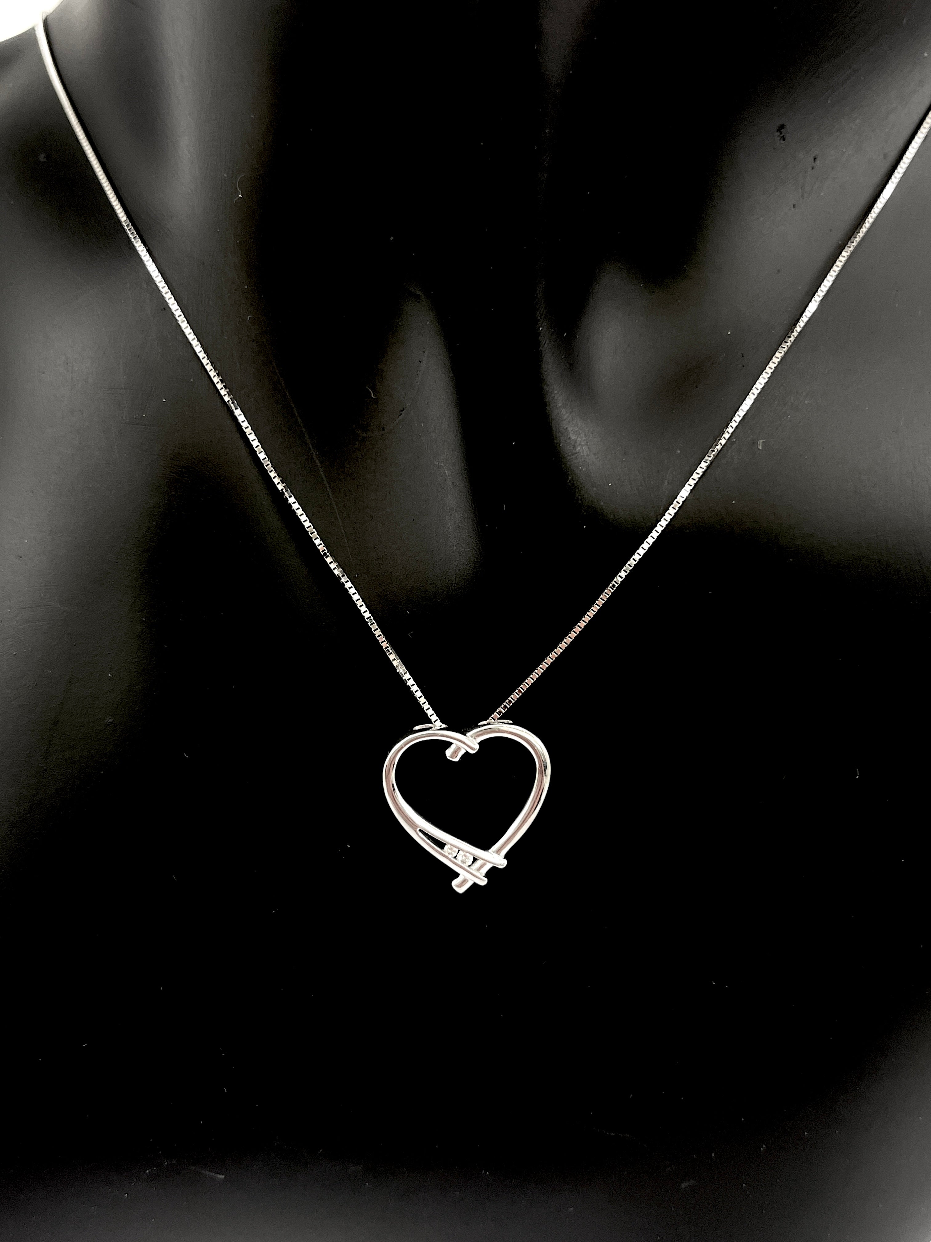 10K White Gold 0.017cttw Round Cut Diamond Pendant