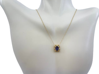 10K Yellow Gold 7x5mm Oval Cut Created Alexandrite and 0.03cttw Diamond Necklace - 18 Inches