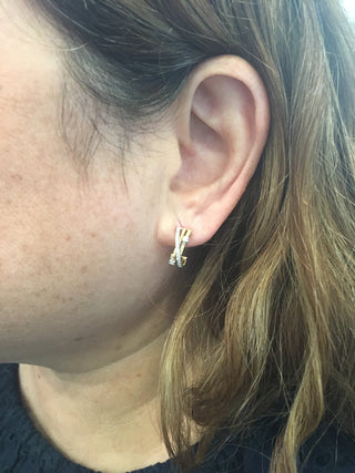 Aretes de diamantes de 0,23 quilates en oro amarillo de 14 quilates