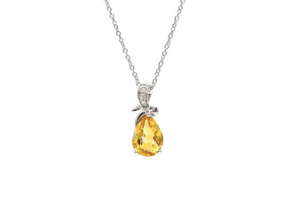 Colgante de oro blanco de 10 quilates con citrino de 8 x 6 mm y diamantes de 0,022 quilates