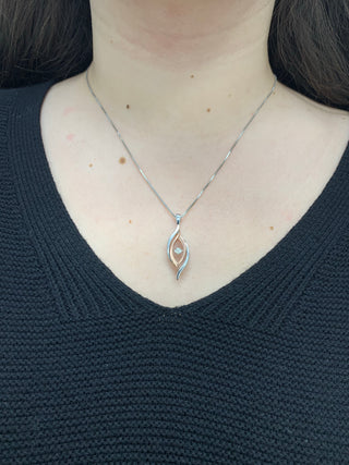Colgante de plata canadiense con diamantes