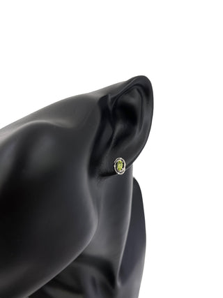 Pendientes de plata de ley con peridoto de talla ovalada de 5x3 mm y diamantes de 0,036 quilates