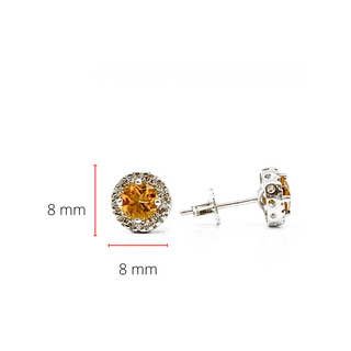 Aretes de diamantes y citrinos en oro blanco de 14 quilates