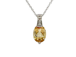 Colgante de oro blanco de 10 quilates con citrino de talla ovalada de 8x6 mm y diamante de 0,022 quilates, 18"