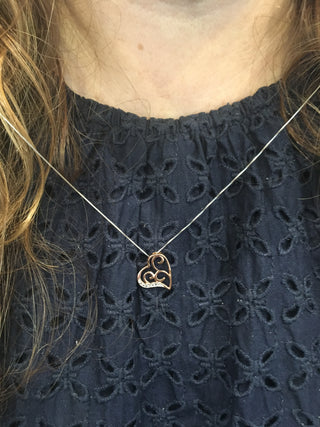 Colgante de corazón de diamantes