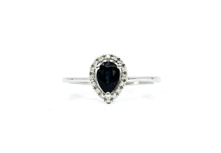 Anillo de oro blanco de 10 quilates con zafiro genuino en forma de pera de 0,60 quilates y diamante de 0,16 quilates
