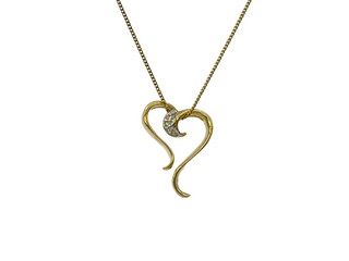 Colgante en forma de corazón con diamantes de 0,015 quilates en oro amarillo de 10 quilates, 18"