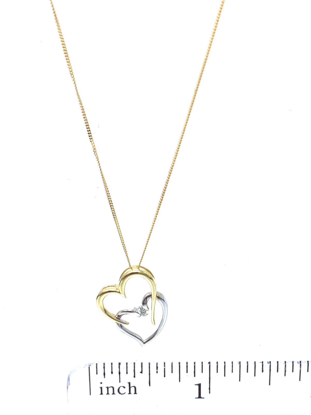 Colgante de doble corazón con diamantes de 0,041 quilates en oro blanco y amarillo de 10 quilates, 18&quot;