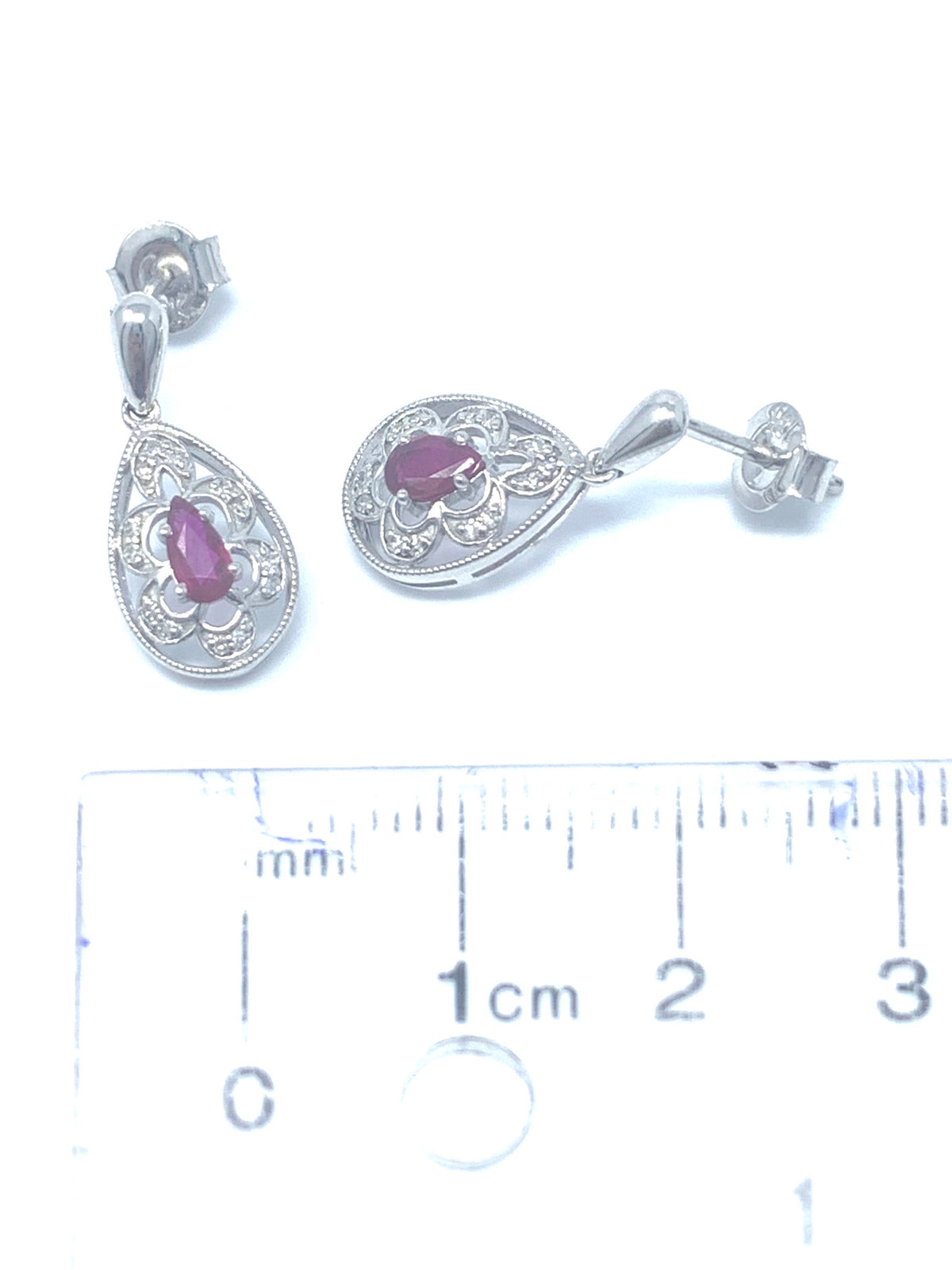 10K White Gold 0.55cttw Genuine Ruby and 0.11cttw Diamond Earrings