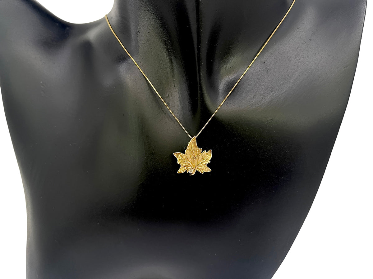 10K Yellow Gold 0.043cttw Canadian Diamond Maple Leaf Pendant, 18&quot;