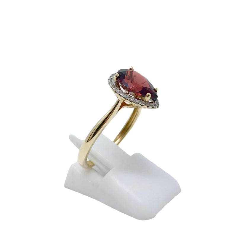 10K Yellow Gold 10 x 7mm Pear Shaped Garnet and 0.135cttw Diamond Ring