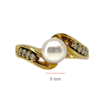 Anillo de oro amarillo de 14 quilates con diamantes cultivados de 6 mm y 0,14 quilates