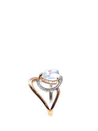 Anillo de piedra lunar y diamantes