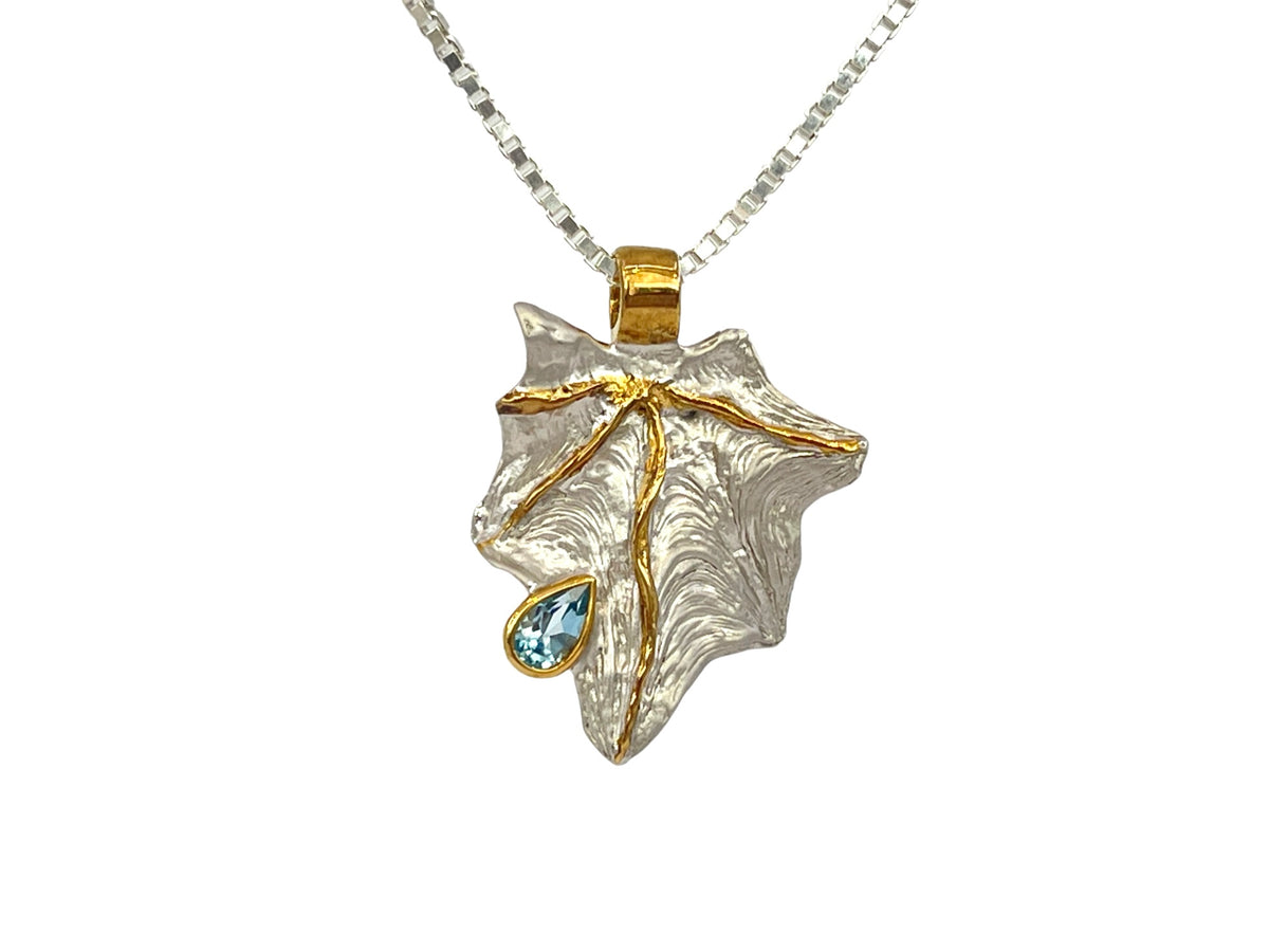 Sterling Silver &amp; 18K Yellow Gold Plated 0.28cttw Blue Topaz Pendant, 18&quot;