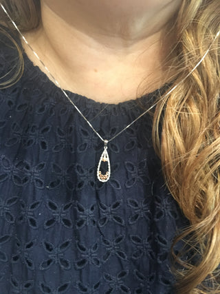 Colgante de diamantes de dos tonos