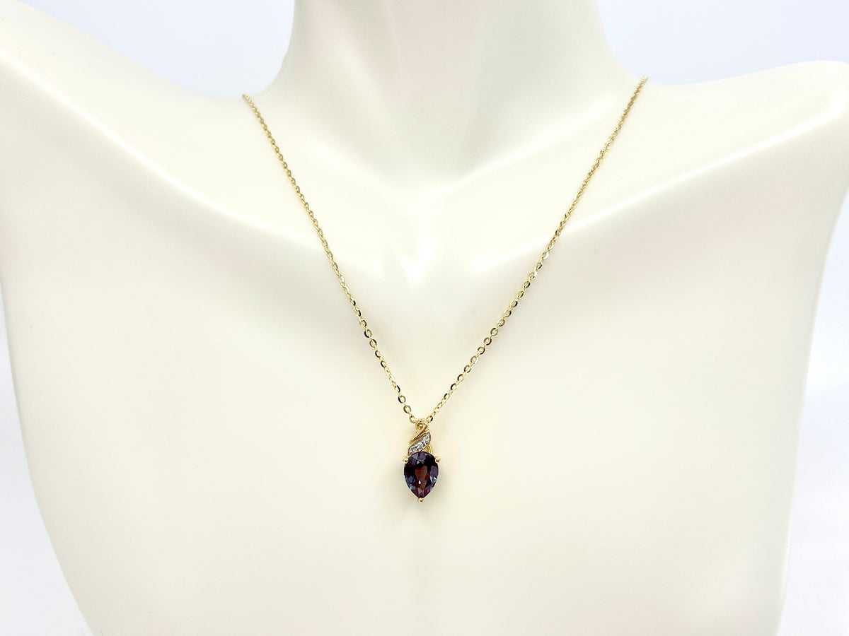 10K Yellow Gold 8x6mm Pear Cut Created Alexandrite and 0.01cttw Diamond Pendant, 18&quot;
